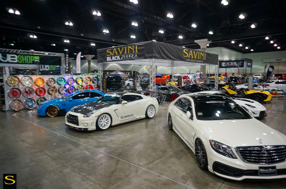 The Project Ronin: Rocket Bunny Mercedes-Benz CLK stood out with its bright blue exterior, while the WALD showcased two rides, including their Nissan GT-R with G-Drive Suspension and Black Bison S550 on BM13 Machined Black wheels. 